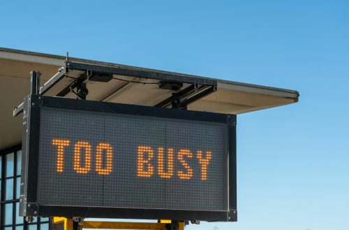a sign with the words too busy written on it